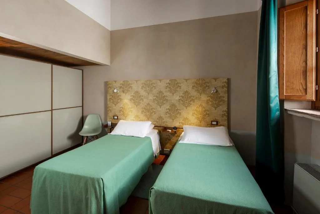 Camera Familiare — Hotel Le Capanne