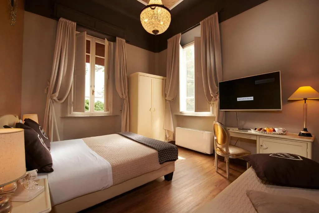 Camera Familiare Tripla — Villa Tower Inn