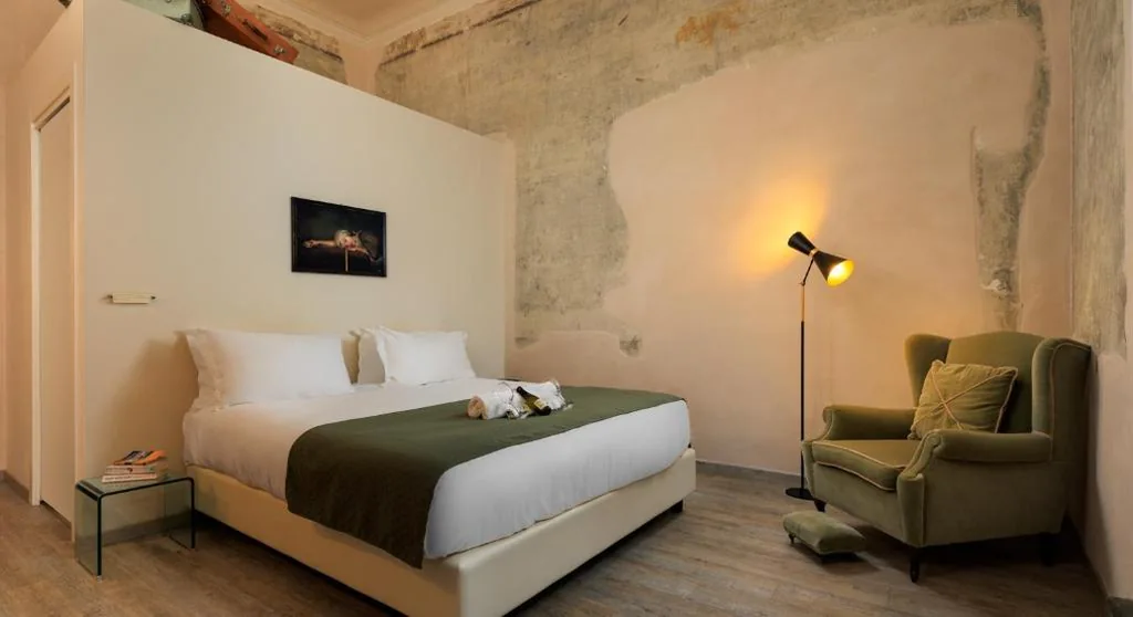 Camera King con Vista Giardino — The Magnificent Maison du Charme