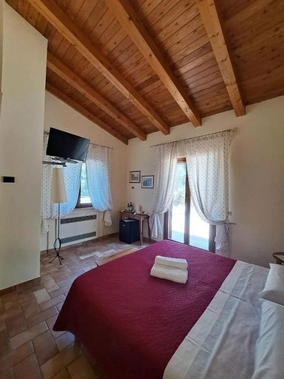Camera Matrimoniale — Casale Terre Rosse Garden