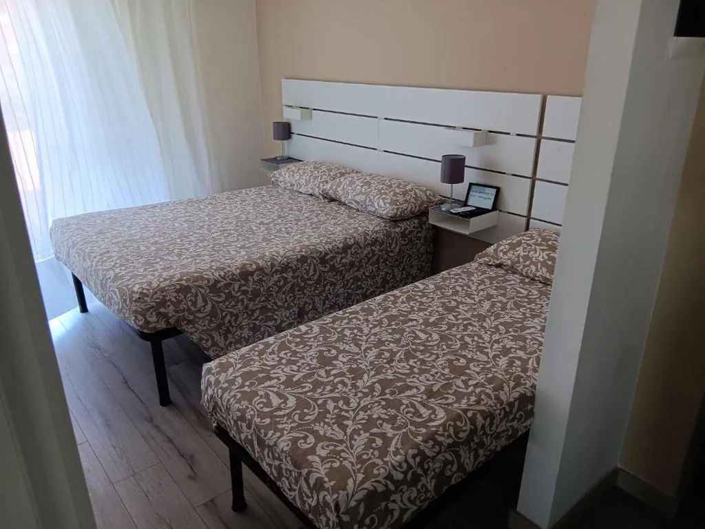 Double Room with External Private Bathroom — ACCADEMIA Rooms