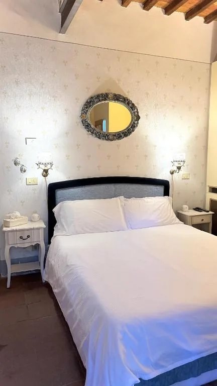 Double Room with Patio — Villa La Dogana – B&B with a lovely garden – Private parking – Slow living in an old-fashioned historical home