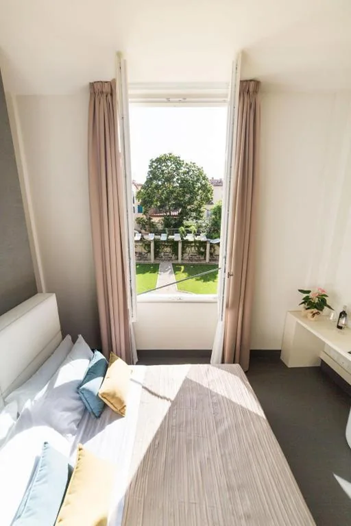 Camera Matrimoniale con Vista Giardino — LUCUS Exclusive Bed and Breakfast