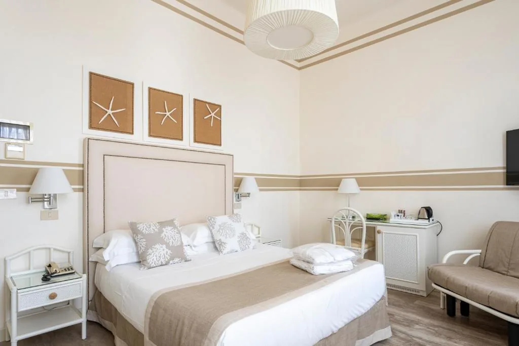 Camera Matrimoniale Deluxe (2 Adulti + 1 Bambino) — Hotel Olimpia
