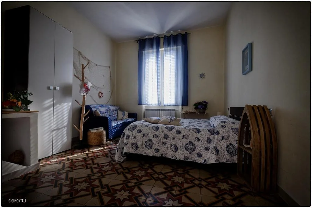 Deluxe Double Room (2 Adults + 1 Child) — La Casa sul Molo