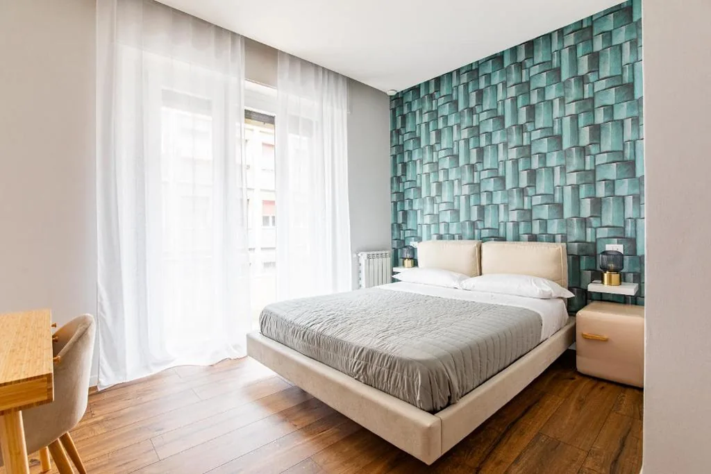 Camera Matrimoniale Deluxe con Balcone — I Bimbi Guesthouse