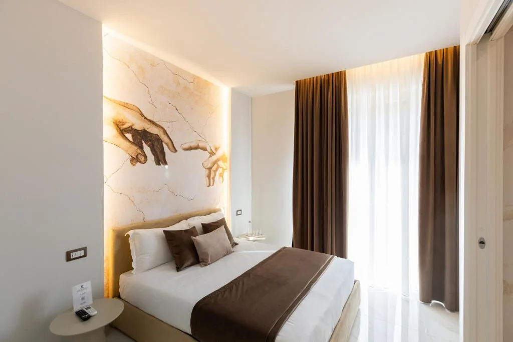 Camera Matrimoniale Deluxe — Michelangelo Central Suites