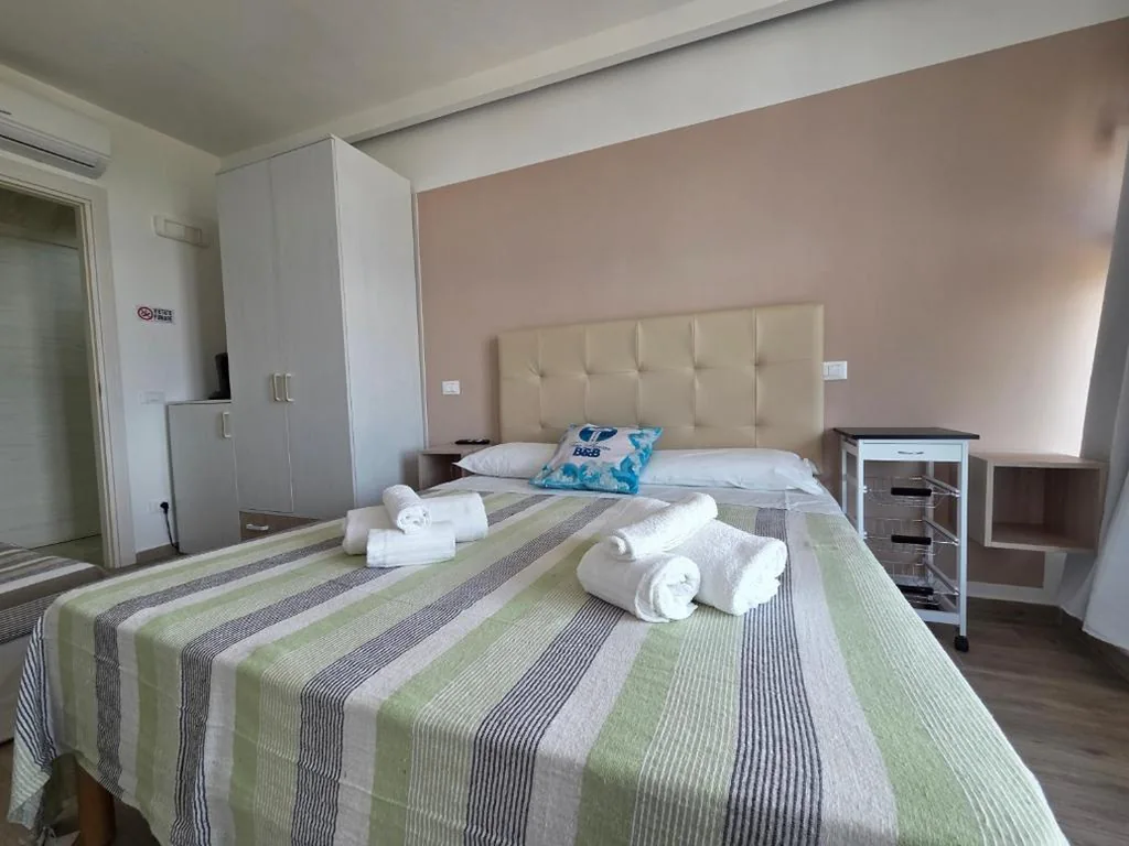Camera Matrimoniale Deluxe — Suite Torre Azzurra B&B – Rooftop Sea View
