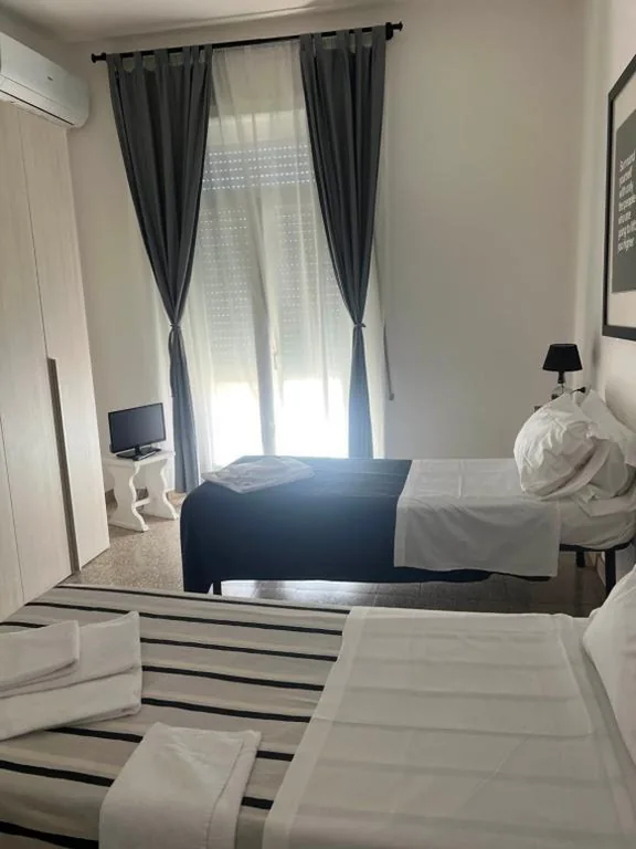 Double or Twin Room with Shared Bathroom — B&B Corso Italia 58