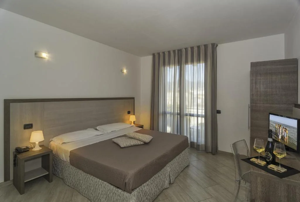 Camera Matrimoniale/Doppia con Letti Singoli con Balcone — Hotel Lido Inn