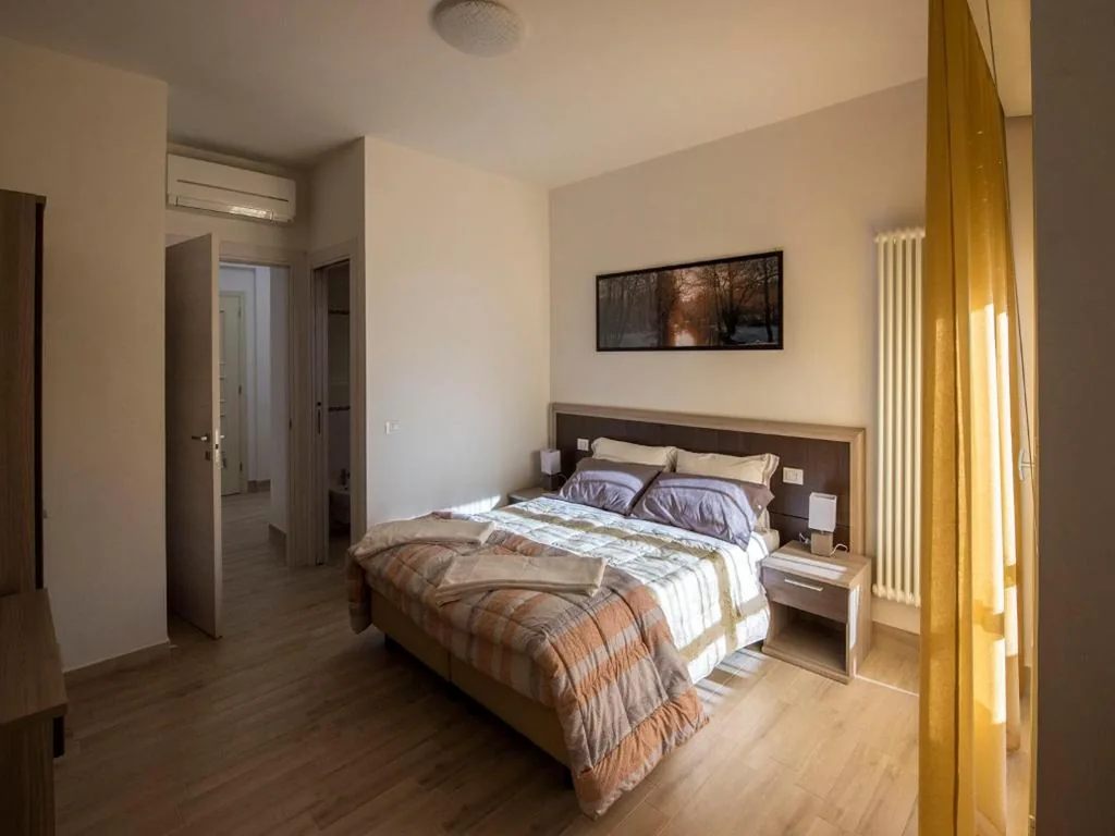 Double or Twin Room with Extra Bed — Affittacamere Le Quattro Stagioni