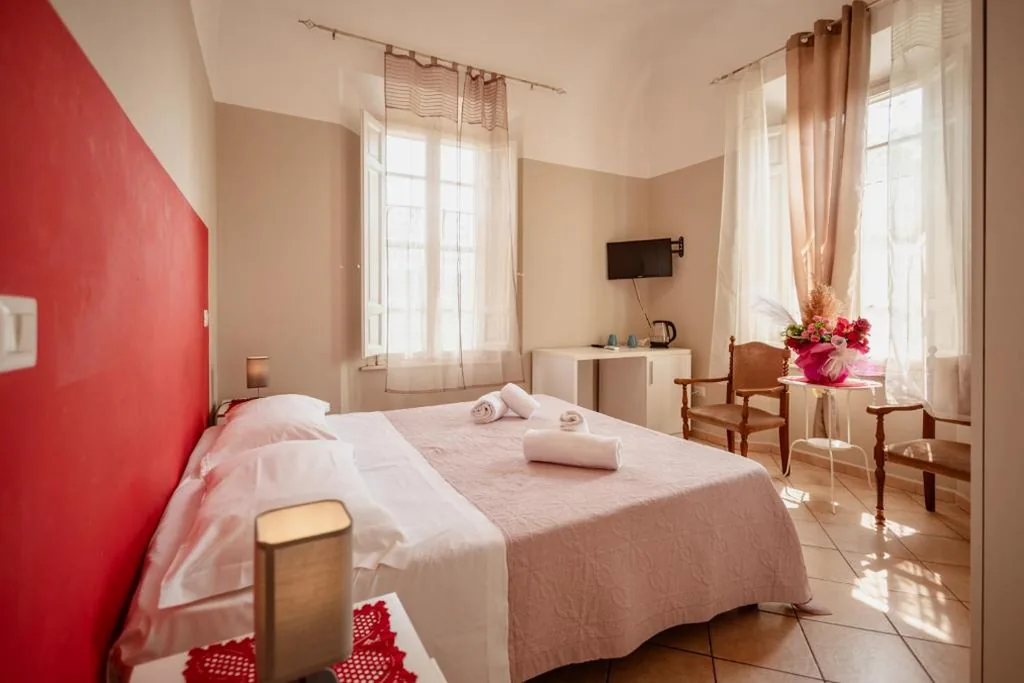 Double or Twin Room with Extra Bed — B&B Toscana