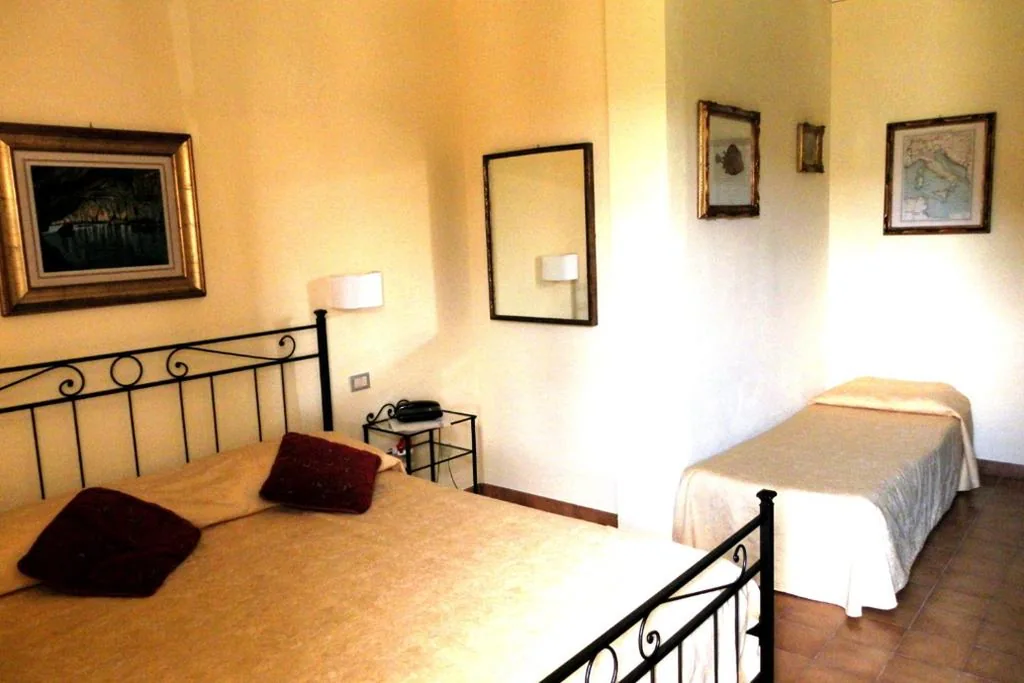 Double or Twin Room with Extra Bed — Hotel Il Caminetto