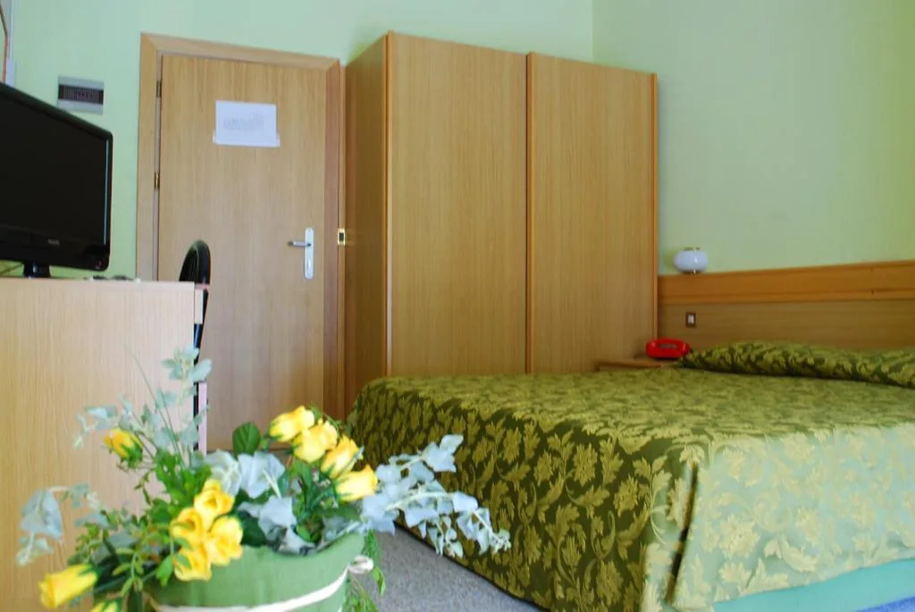 Double or Twin Room with Extra Bed — Hotel Stella Maris