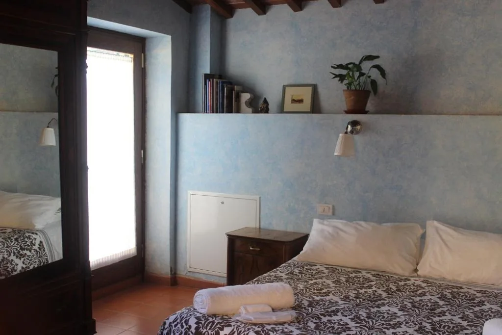 Camera Matrimoniale/Doppia con Letti Singoli con Vista Giardino — Al Canto B&B