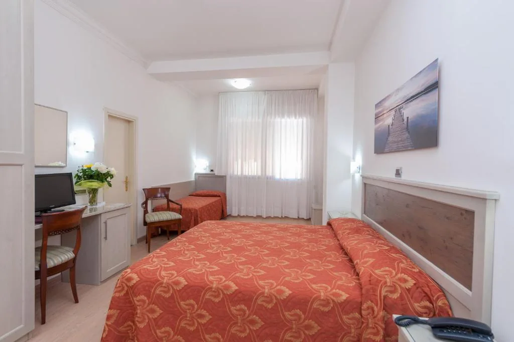 Camera Matrimoniale Standard — Hotel Suisse