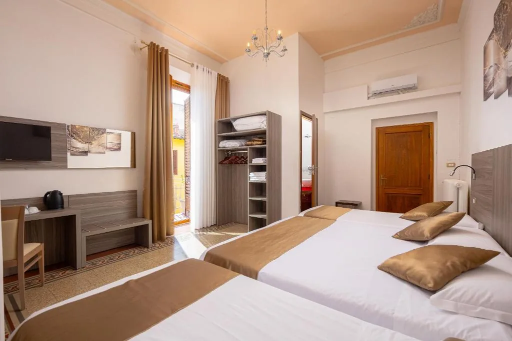 Quadruple Room — Astrid Hotel