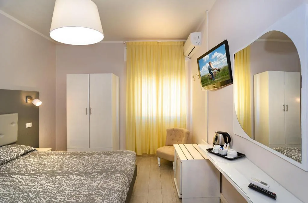 Camera Quadrupla — City Hotel