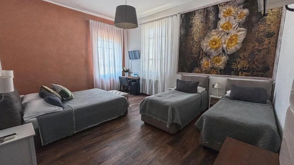 Classic Quadruple Room — B&B 7 Rooms