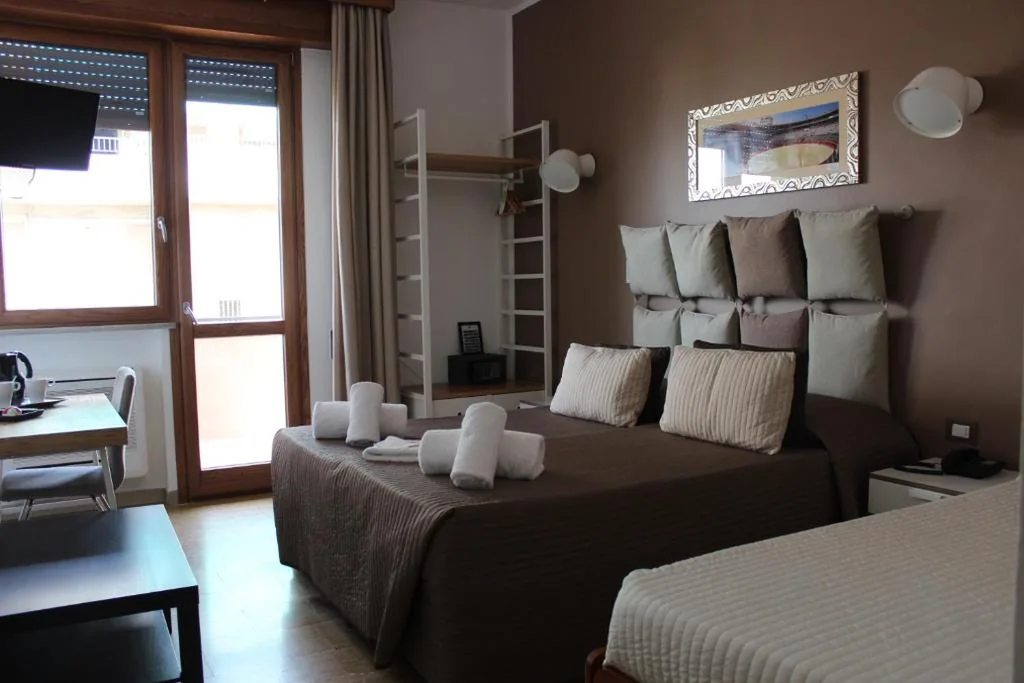 Classic Quadruple Room — Hotel Franchi