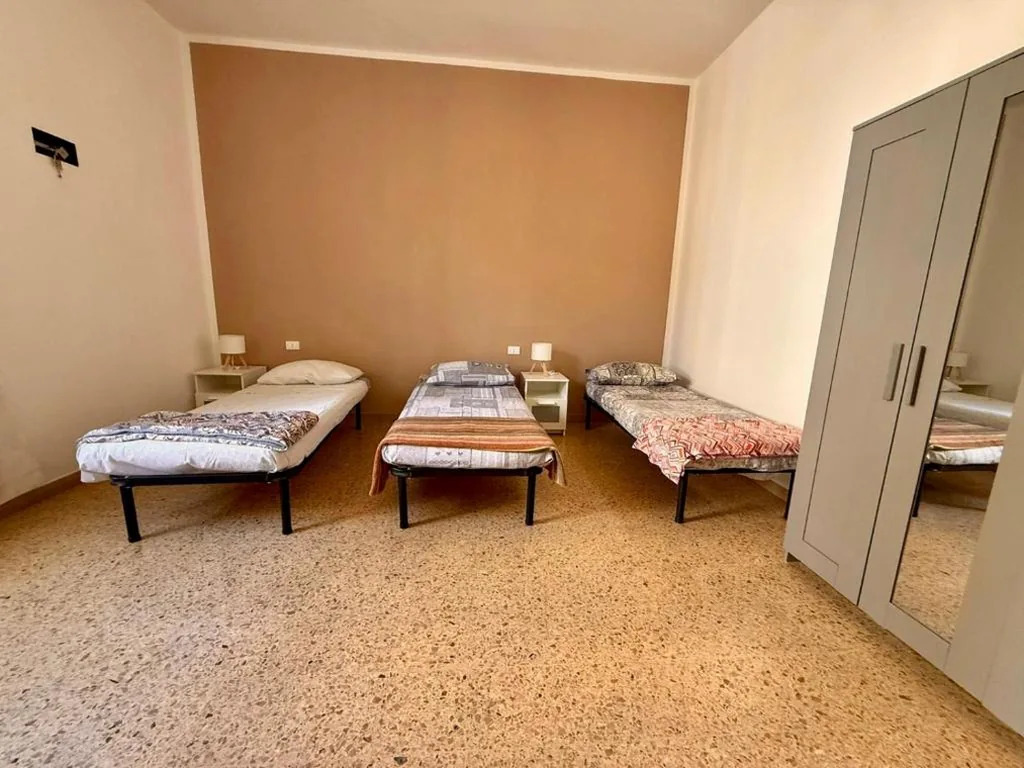 Camera Quadrupla con Bagno in Comune — MAGA rooms