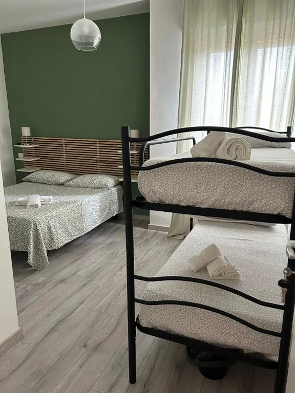 Quadruple Room with Private Bathroom — ACCADEMIA Rooms