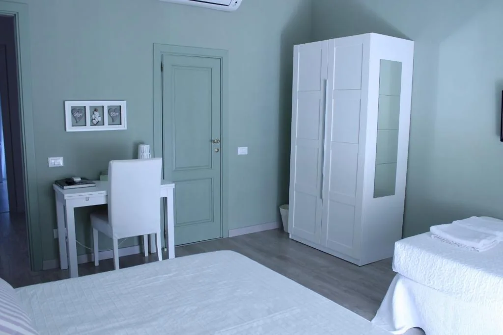 Quadruple Room with Private Bathroom — B&B Nannalia