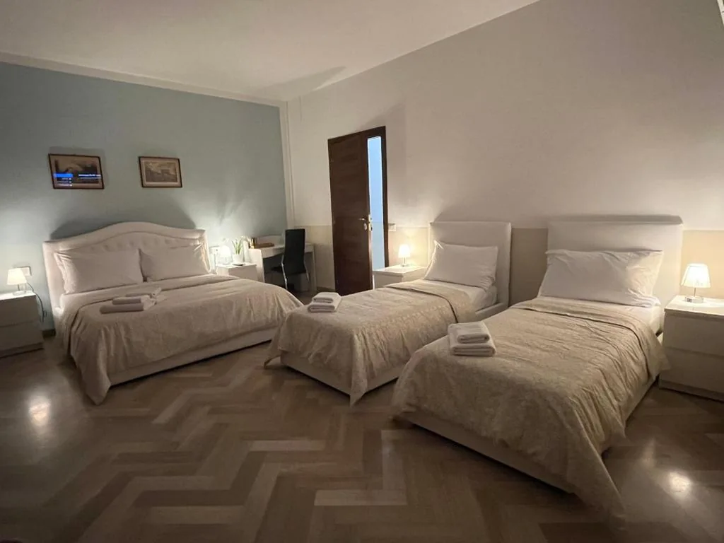 Quadruple Room with Private Bathroom — B&B Prime Sant’Agostino