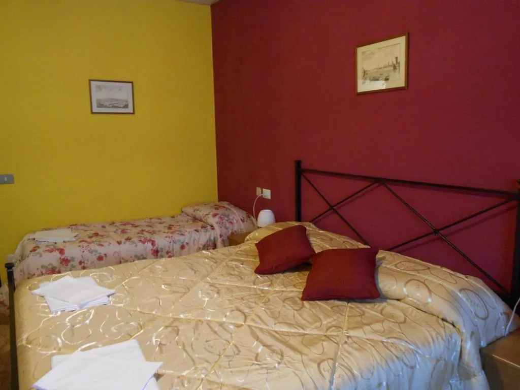 Quadruple Room with Private Bathroom — Hotel Aline