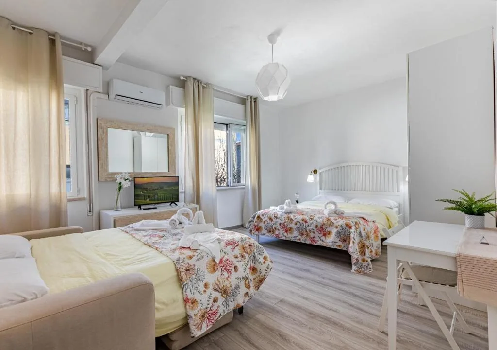 Quadruple Room with Private Bathroom — Il Merlo