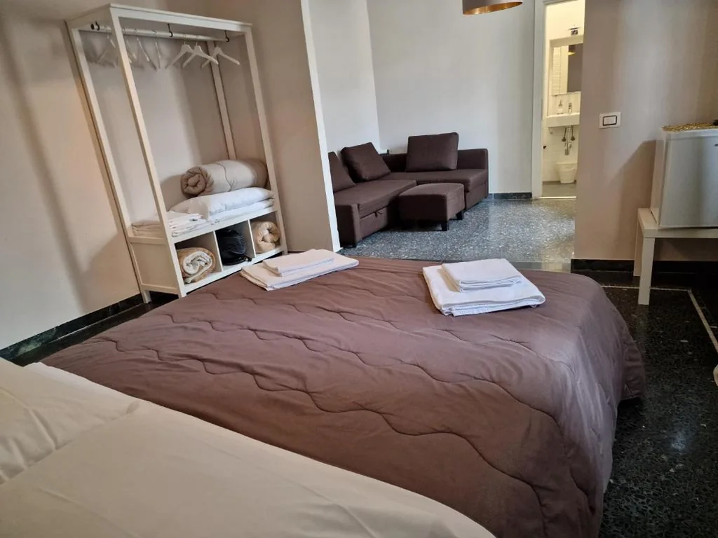 Quadruple Room with Private Bathroom — Le logge