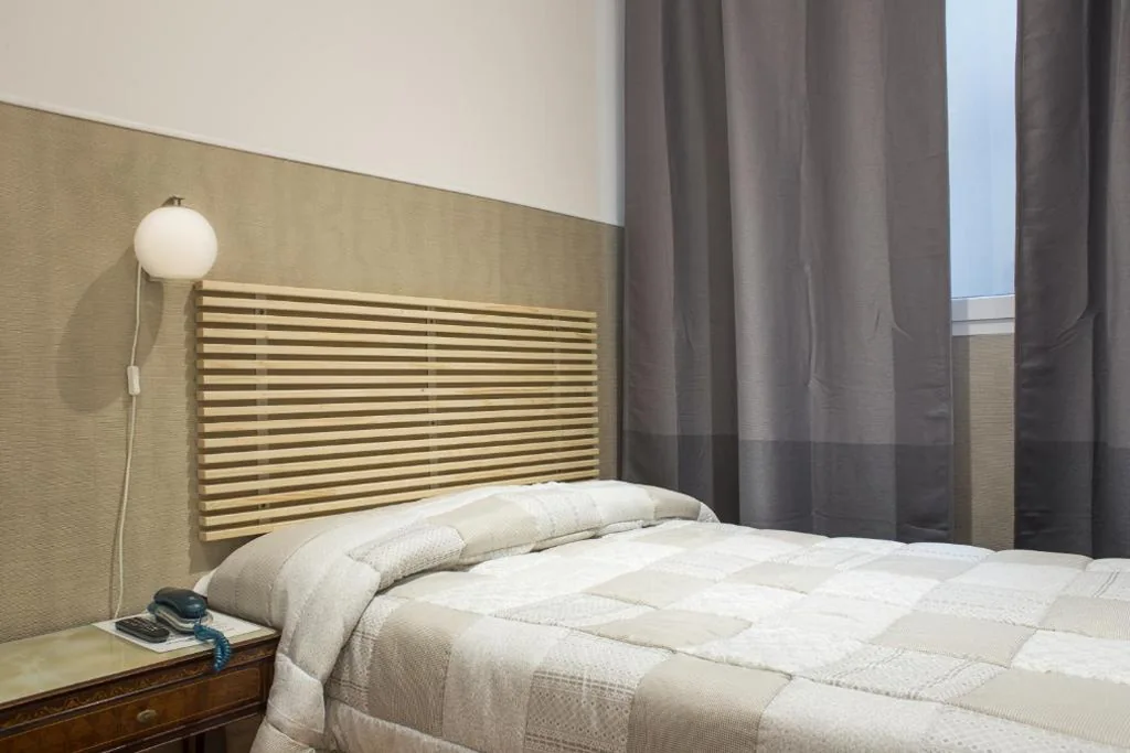 Quadruple Room with Private Bathroom — Loggia Fiorentina