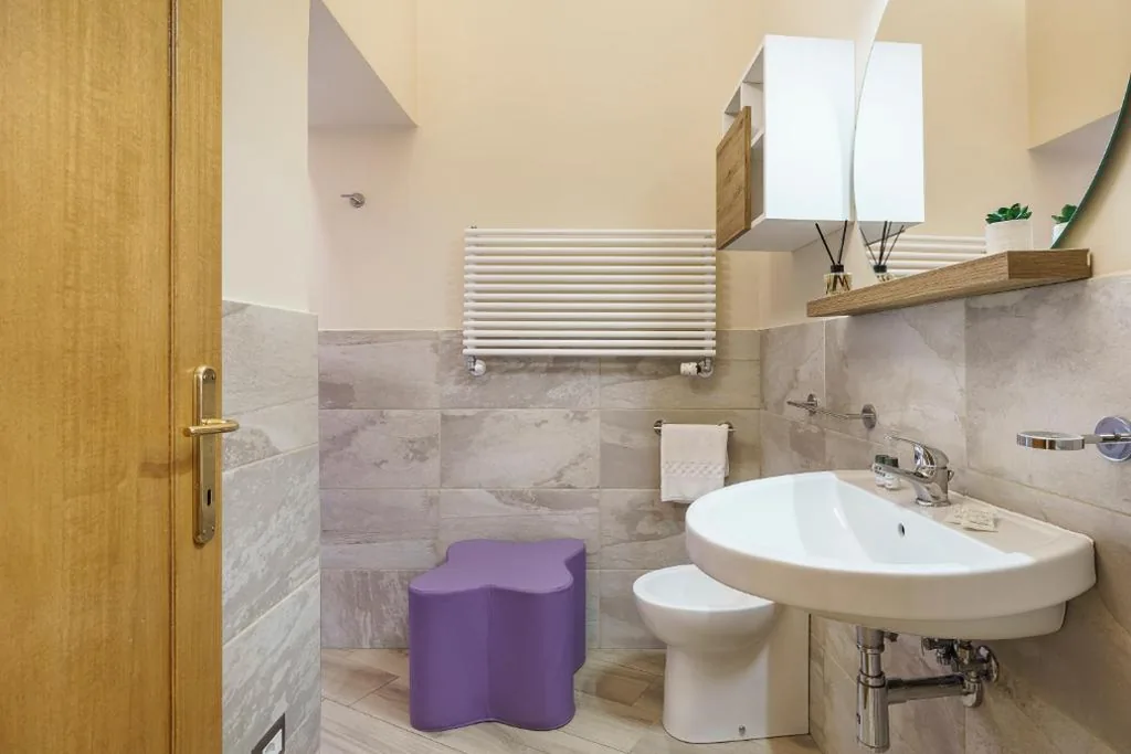 Quadruple Room with Private Bathroom — Repubblica Suites By San Firenze Collection