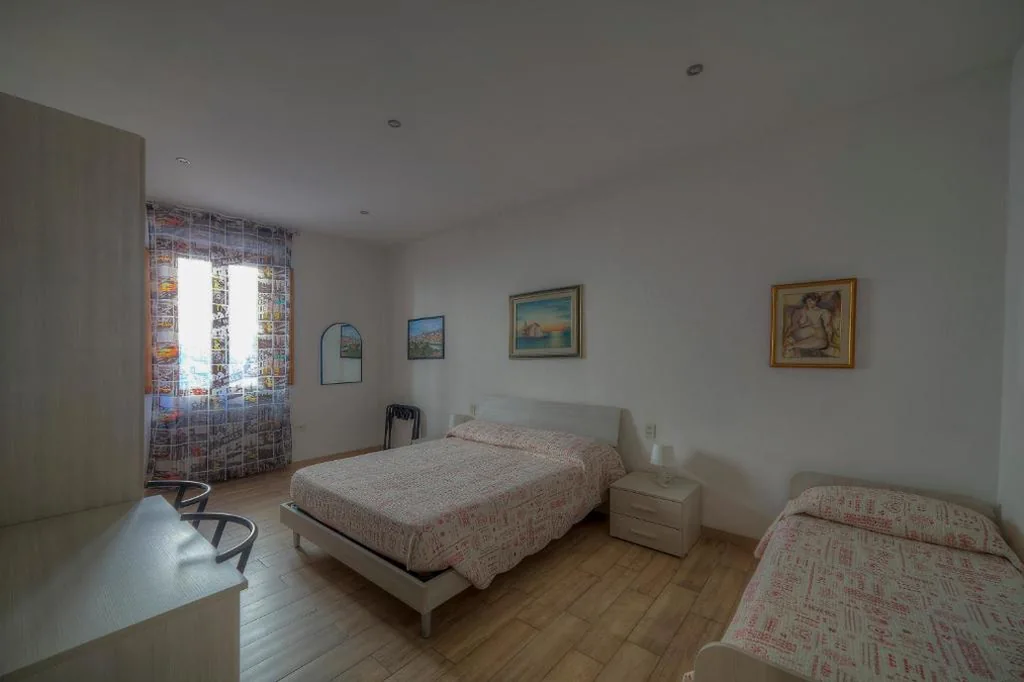 Quadruple Room with Private Bathroom — Sogni D’Oro Guest House