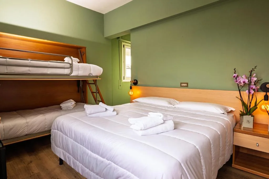 Camera Quadrupla con Balcone — Hotel Laurin