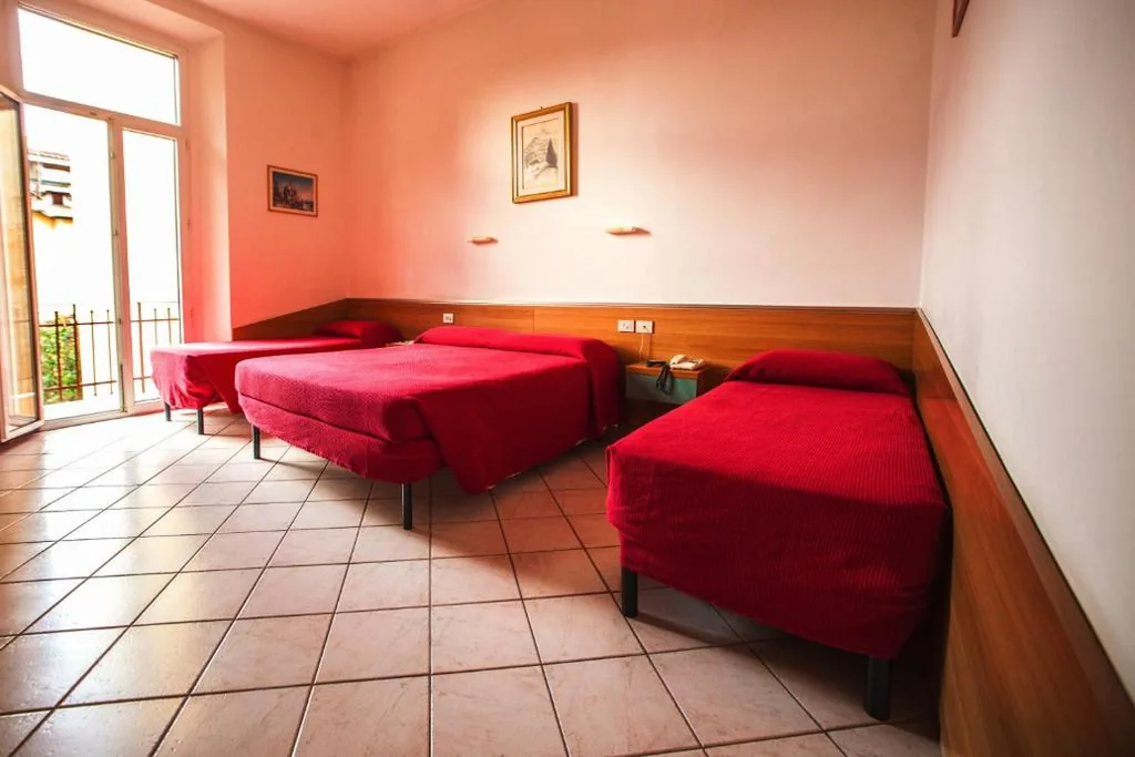 Quadruple Room with Balcony — Hotel Villa Il Castagno