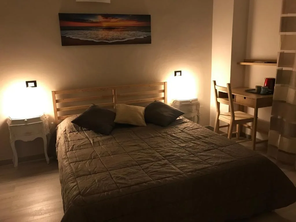 Camera Quadrupla con Terrazza — ATTICO LIVORNO Bed & Relax