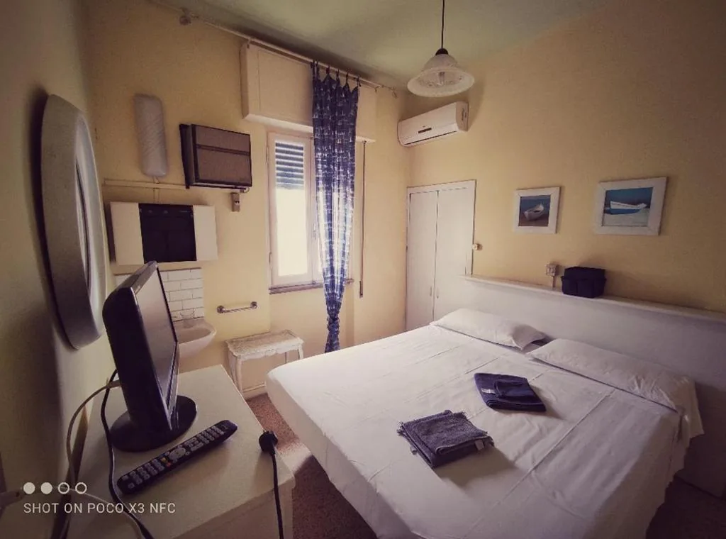 Quadruple Room with Terrace — Hotel Delhy