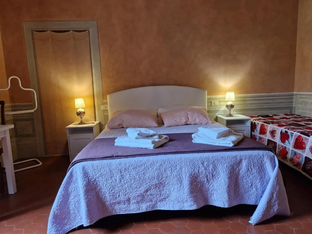 Camera Quadrupla con Vista Giardino — B&B i Rinascimenti