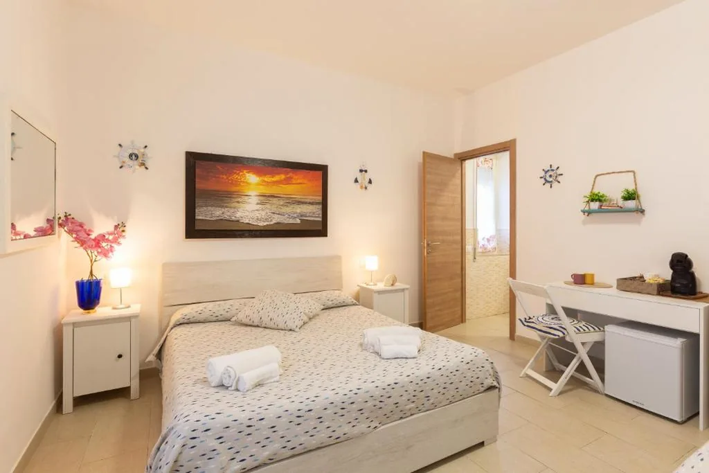Quadruple Room with Garden View — Il Poggetto di Porto Ercole Affittacamere