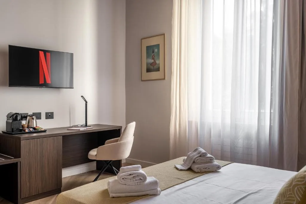 Camera Quadrupla Deluxe — Domus Mea Suite
