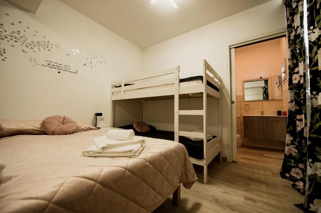Quadruple Room — Dorothy Affittacamere