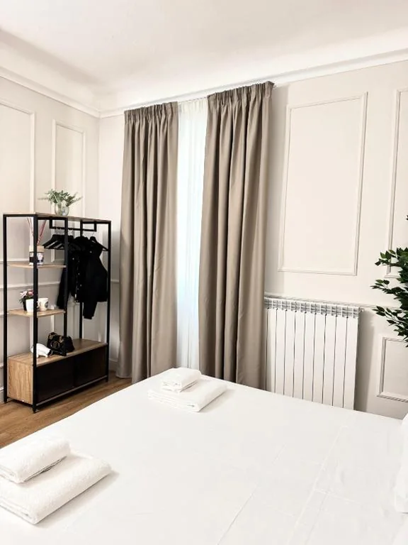 Camera Quadrupla Economy — Cattaleya rooms
