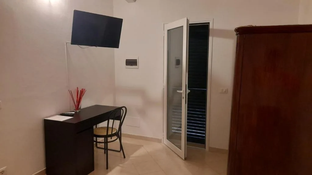 Camera Quadrupla Economy — Villa Liberty Versilia