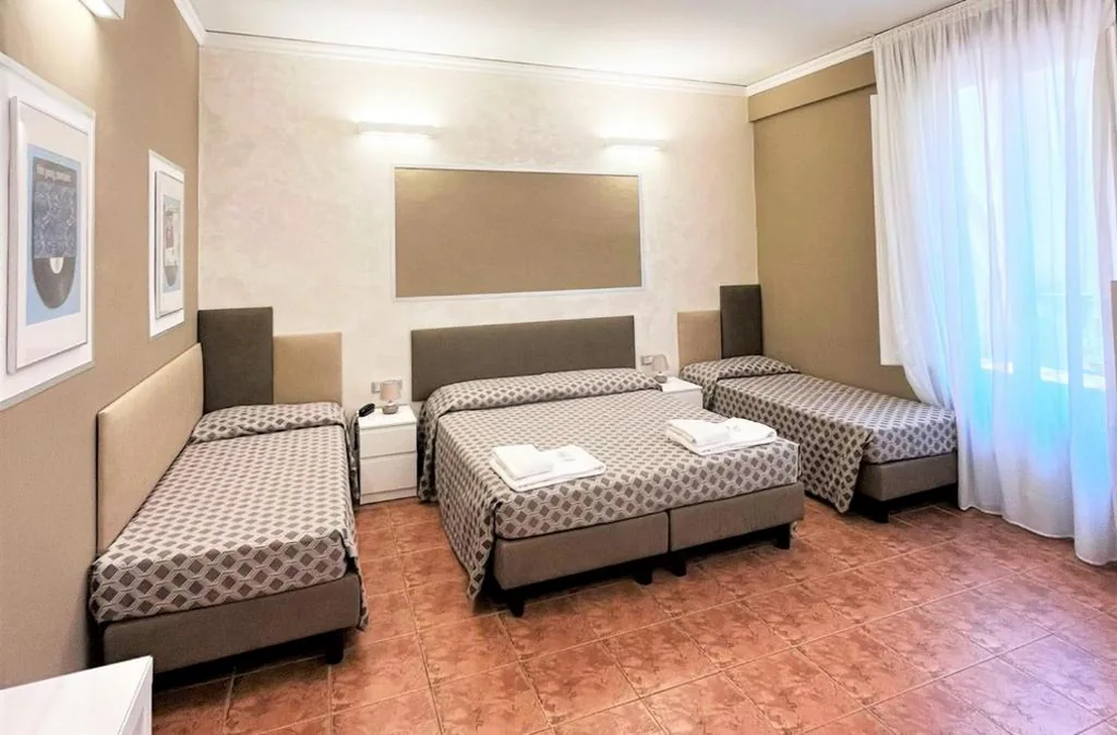 Quadruple Room — Hotel Alinari