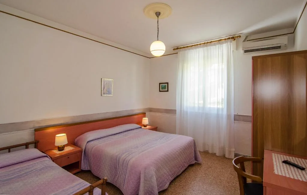 Quadruple Room — Hotel Ambra
