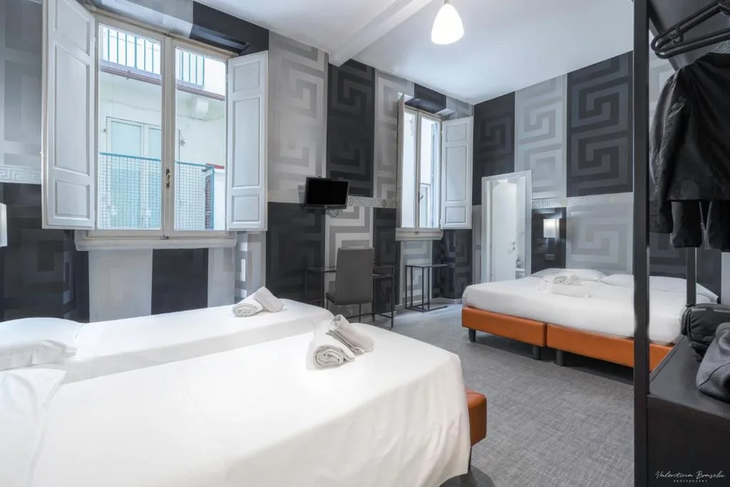 Quadruple Room — Hotel Argentina