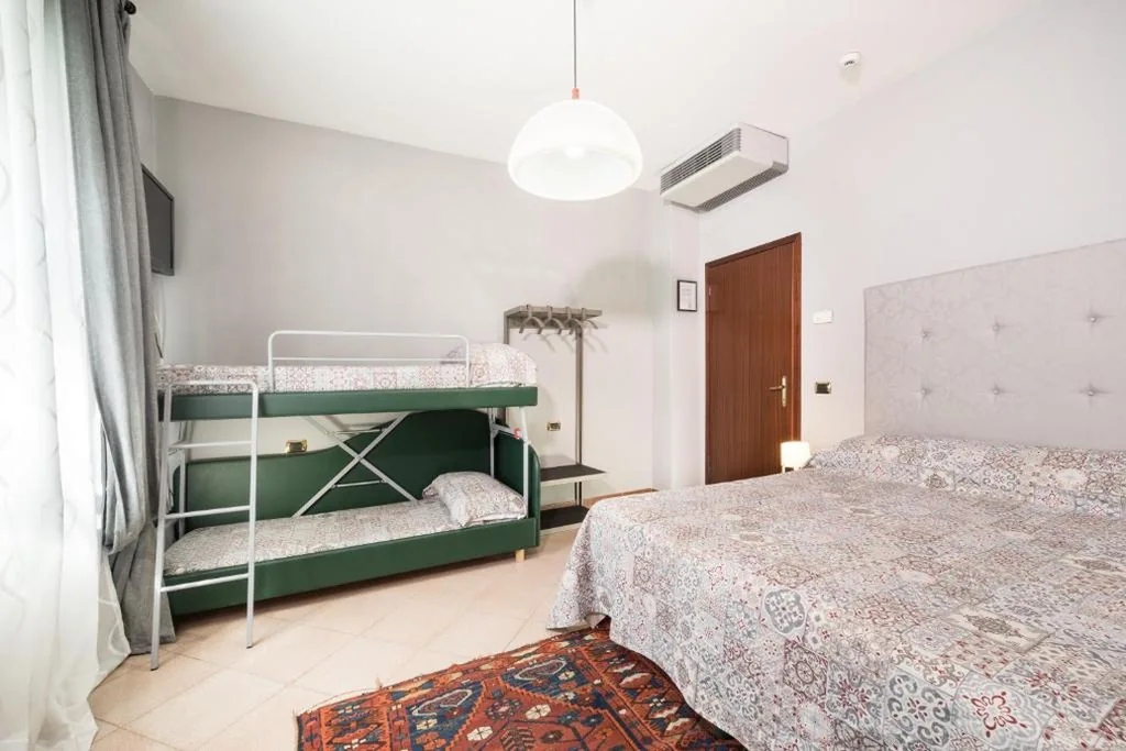 Quadruple Room — Hotel Bernardino