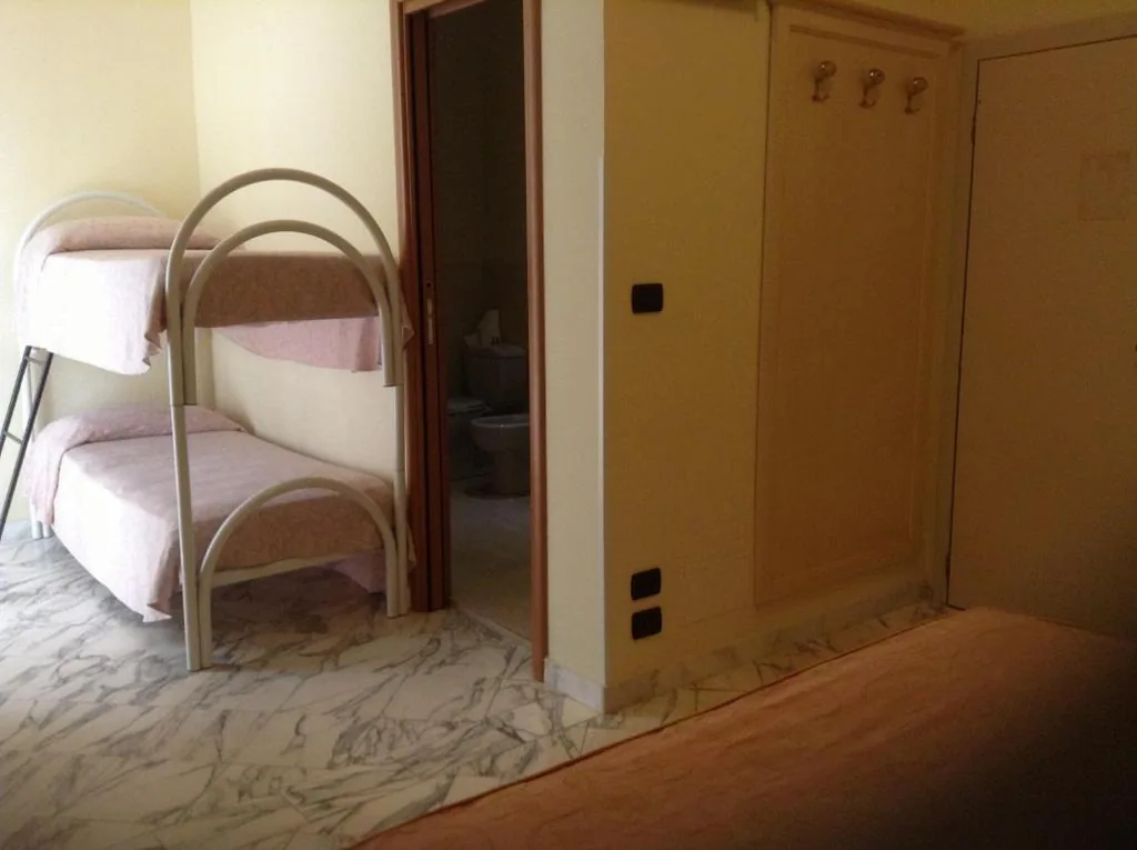 Camera Quadrupla — Hotel Coluccini