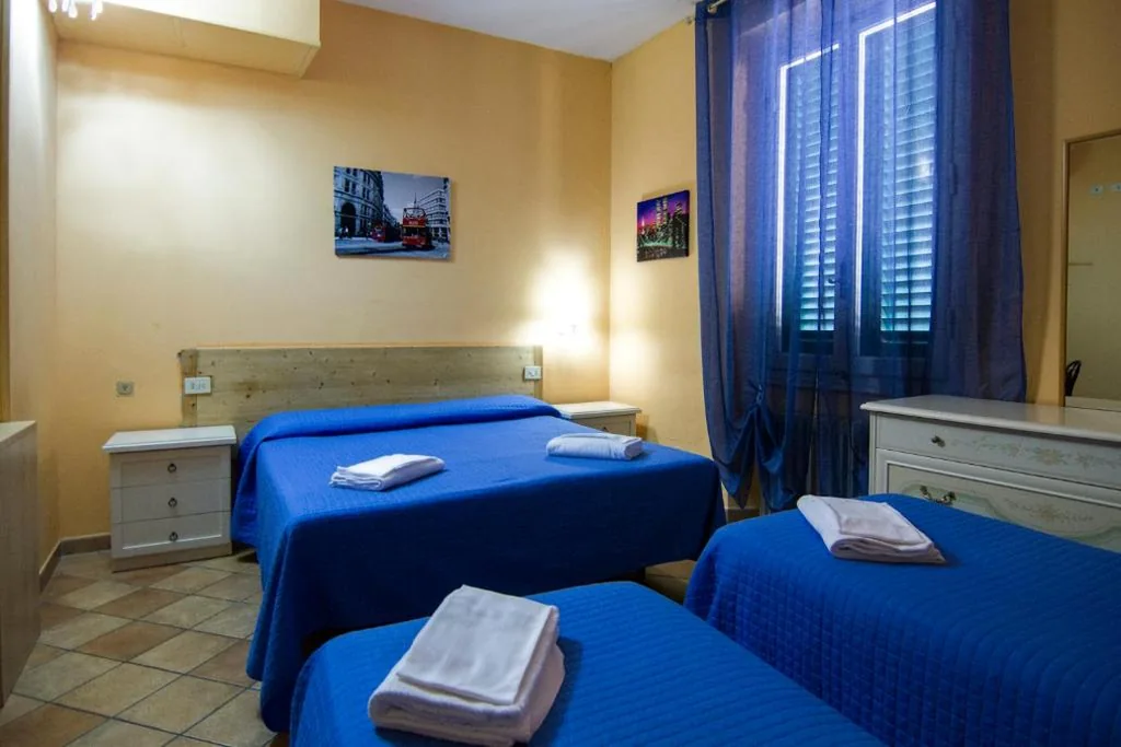 Quadruple Room — Hotel Cordova